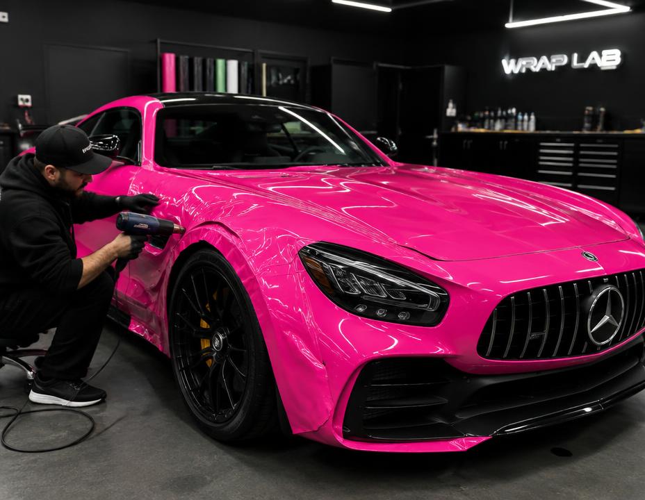 Mercedes-AMG GT being wrapped in hot pink